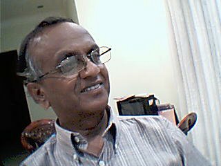 Dr.M.K.முருகானந்தன் M.B.B.S(Cey), D.F.M(SL), M.C.G.P(SL) 