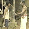 அழுத்தம் (Under Stress) என்னும் படத்தில், குண்டுக் காப்புக் குழிக்குள் ஓடிய போதும், புத்தகத்தை எடுத்துக் கொண்டுவா என்று கட்டளையிடும் தந்தையையும், திரும்பிவரும்வரை பதகளித்தபடி இருக்கும் தாயையும் பார்க்கிறோம்